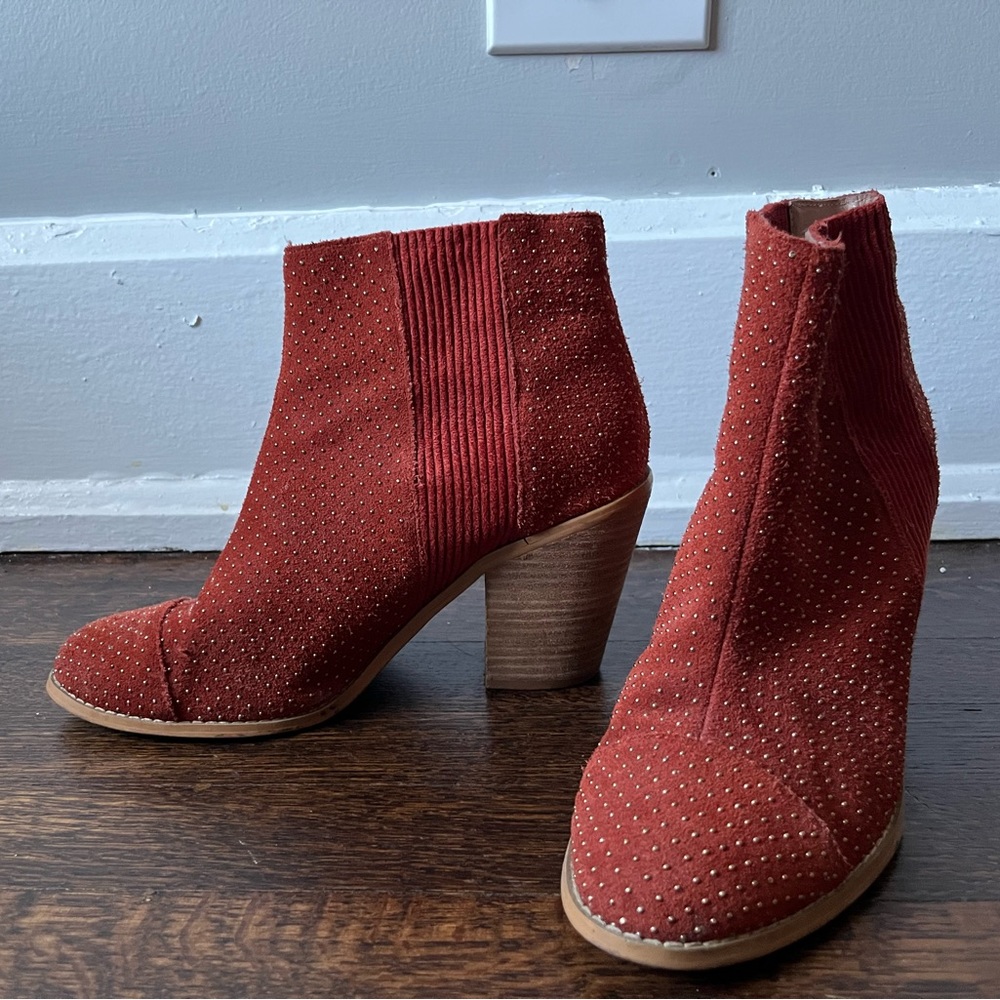 Anthropologie orange booties, brass studs